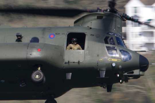 13 April 2021 - 15-26-03
This is one of those aboard the low flying Chinook (ZH901). Doesn't look like the First Sea Lord. Or Boris.
----------------
RAF Chinook ZH901 Dartmouth flypast